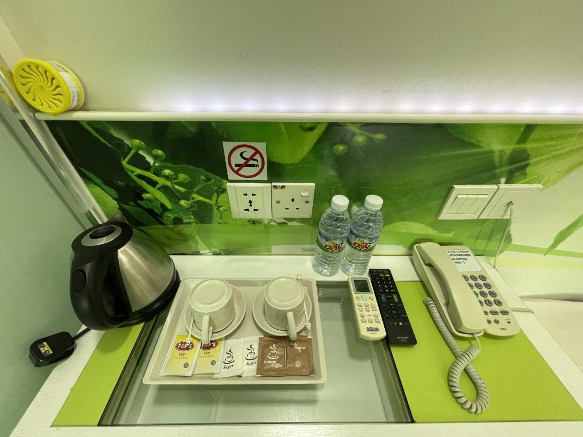Green Apple Boutique Hotel Кота-Кинабалу Экстерьер фото